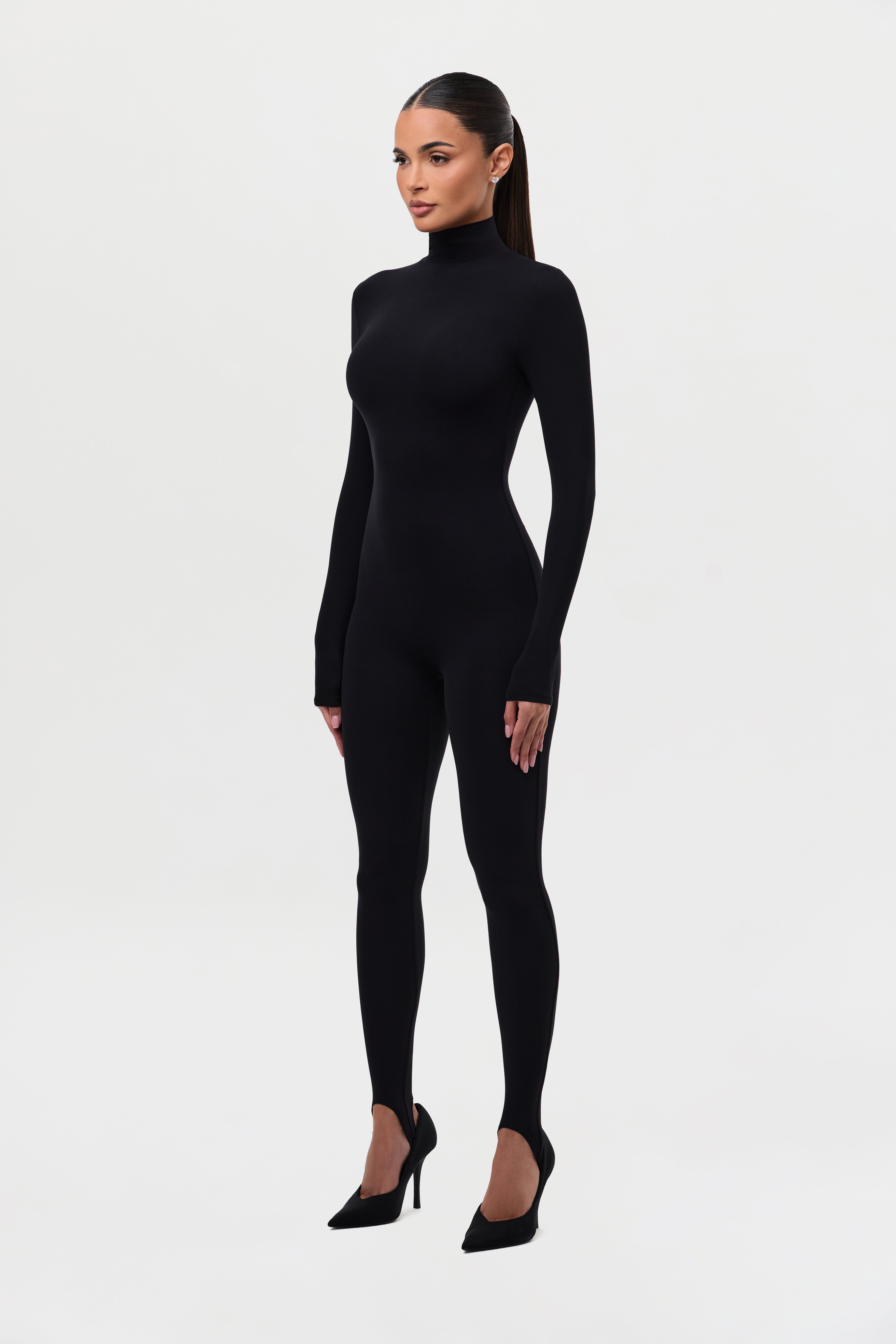 Naked Turtleneck Stirrup Jumpsuit