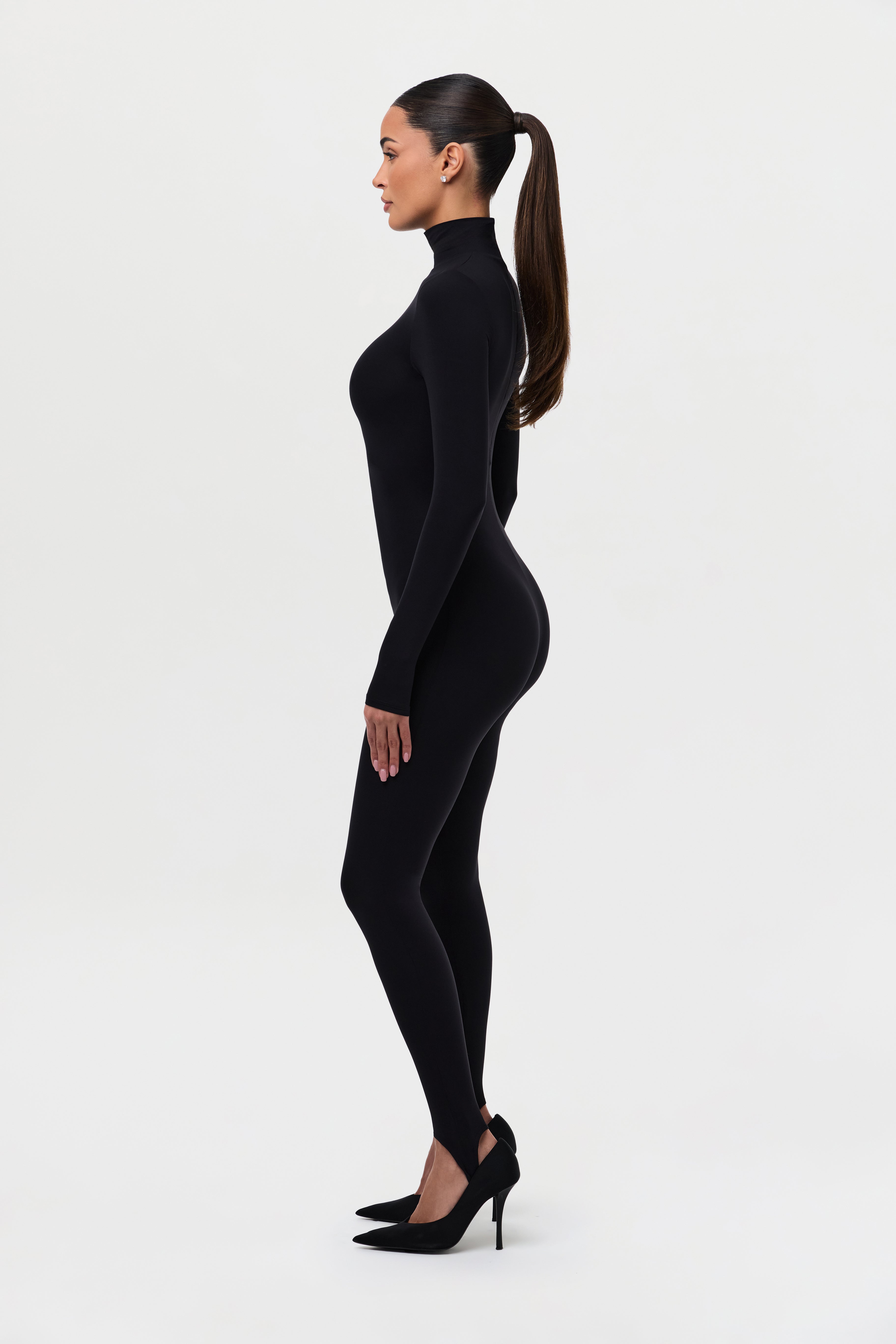 Naked Turtleneck Stirrup Jumpsuit