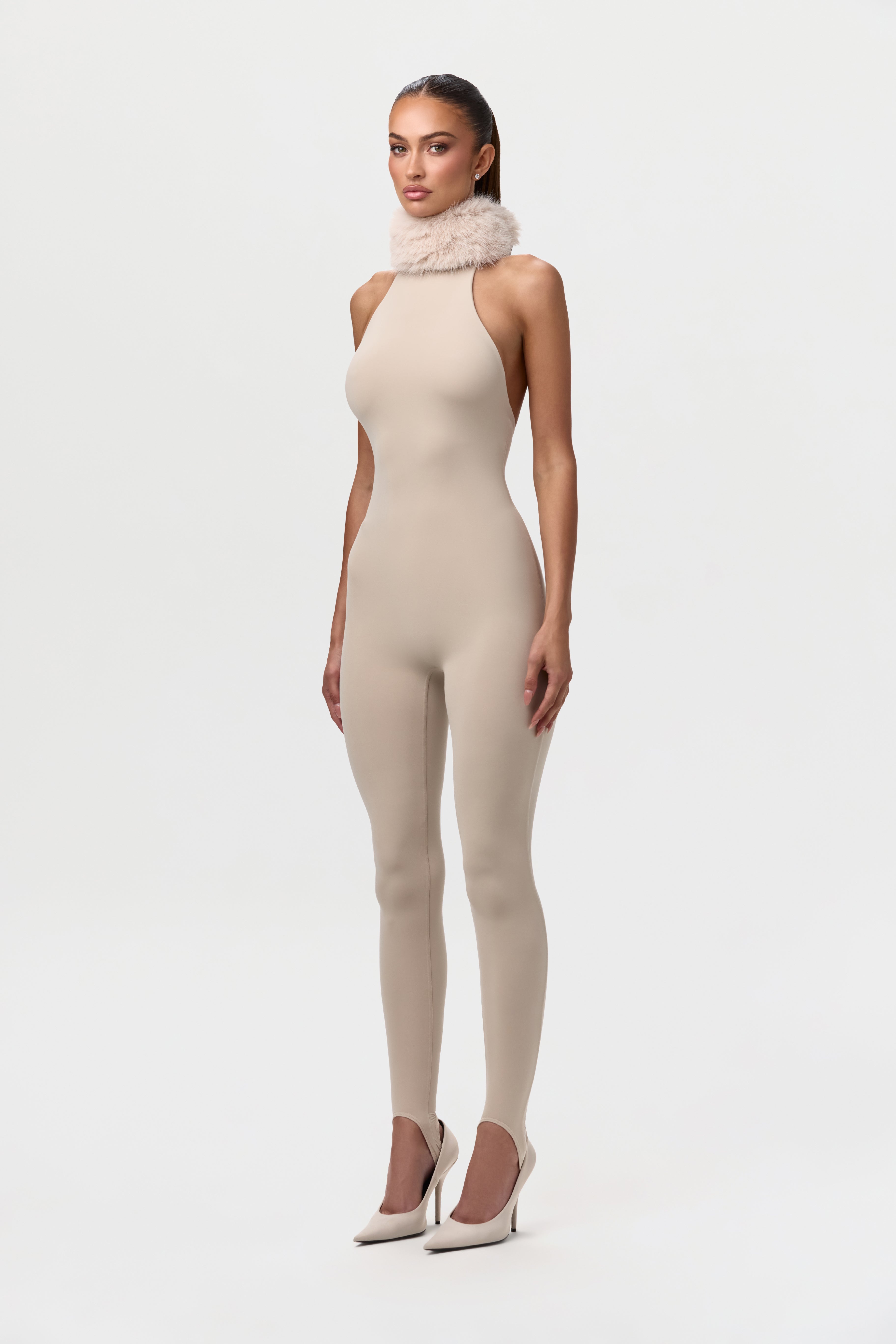 Naked Stirrup Jumpsuit with Fur Collar