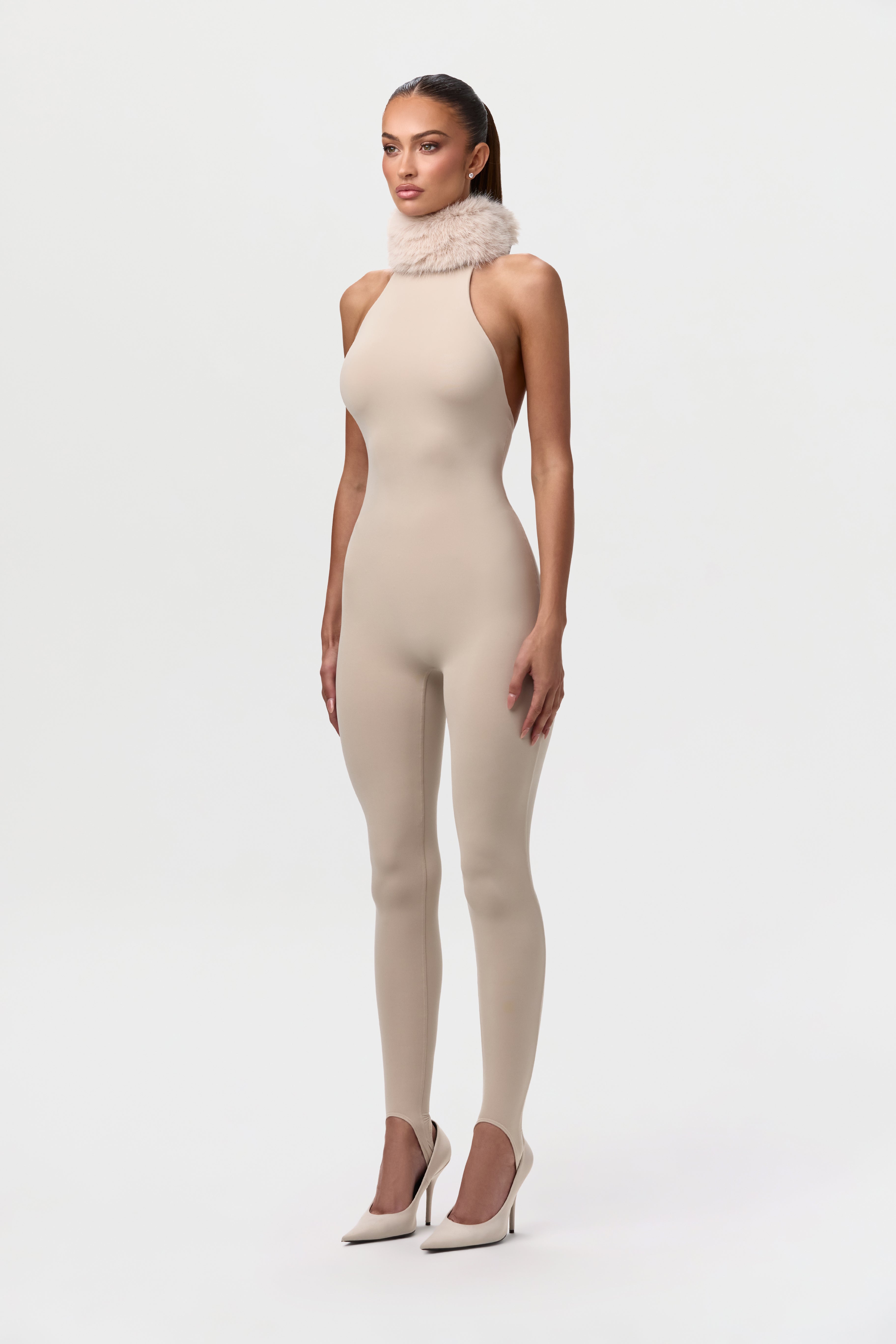 Naked Stirrup Jumpsuit with Fur Collar
