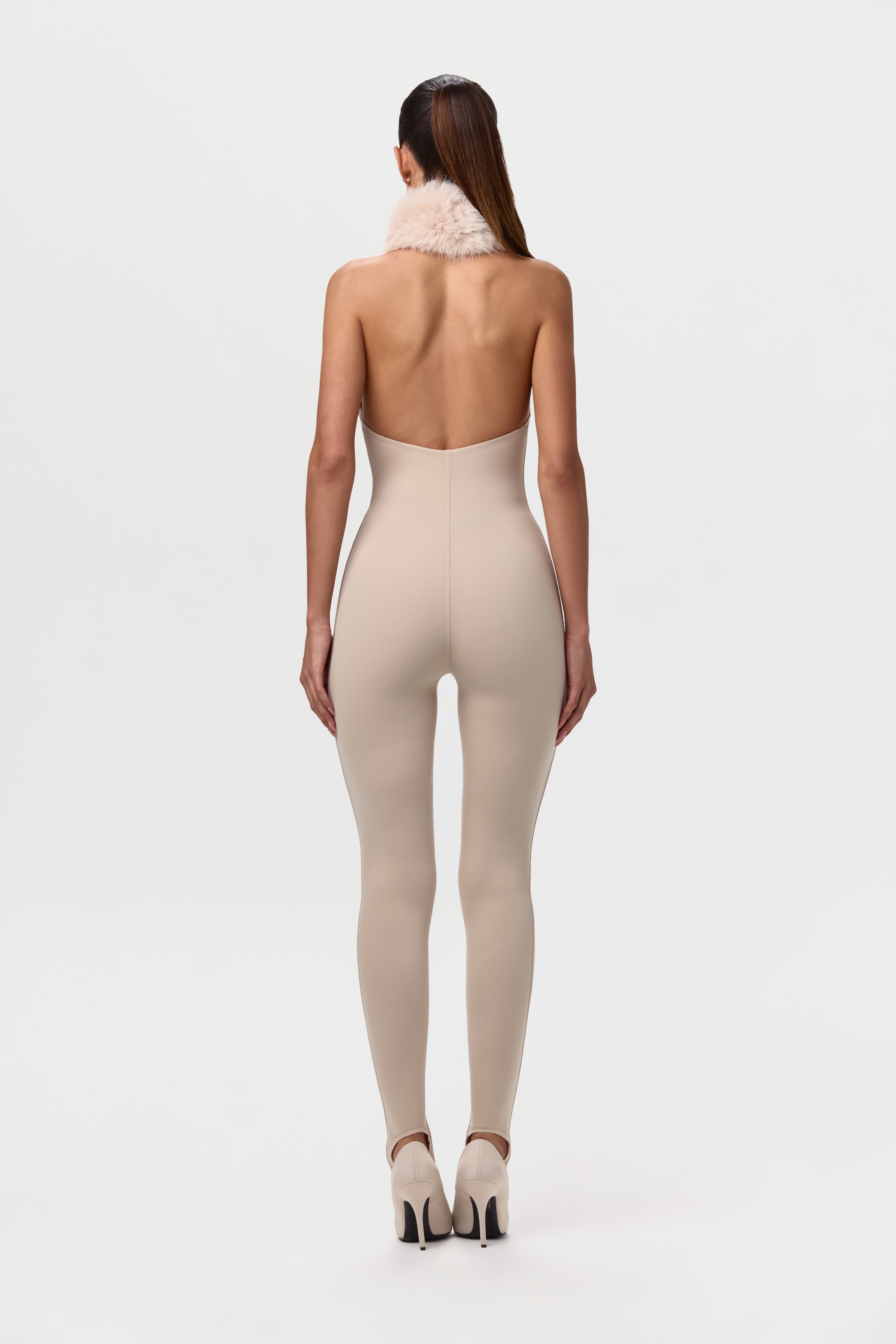 Naked Stirrup Jumpsuit with Fur Collar